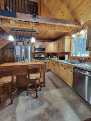23 CHAMPAGNE RD, JIM POND TWP, ME 04936, photo 5 of 49